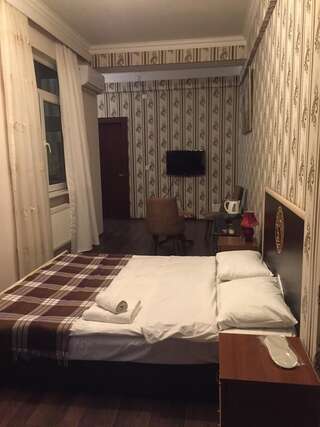 Отель Rotterdam Баку Двухместный номер Делюкс с 1 кроватью и душем-1